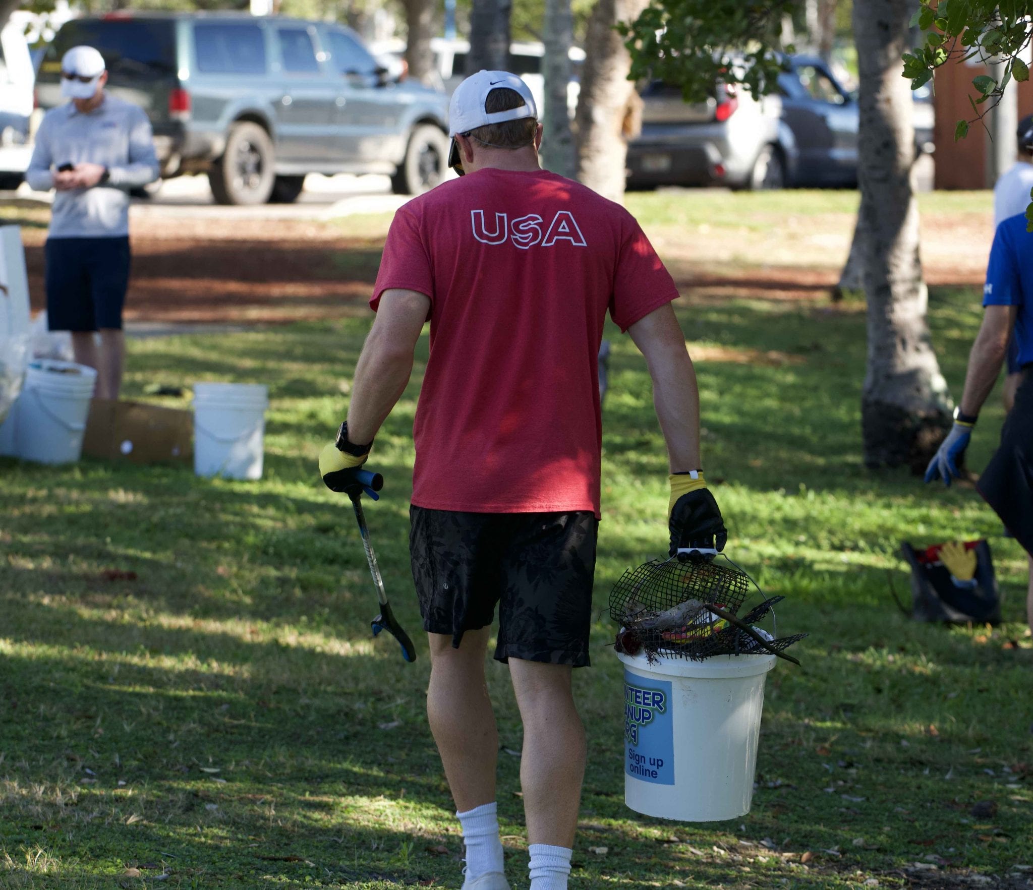 US Sailing Athlete participating in coastal cleanup